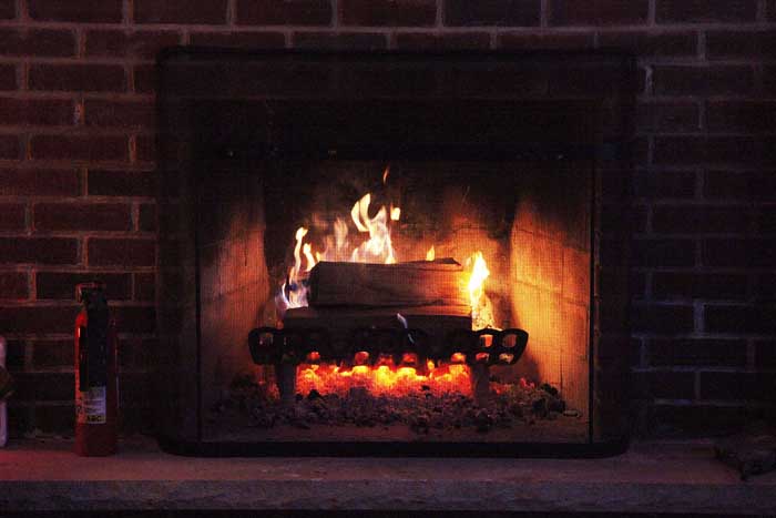 Here is a close-up of my favorite part of my house.  It also saves me some money on heating during those cold Winter months.  I know that Witchy also loves fire places, so I thought I would post a picture of mine.
